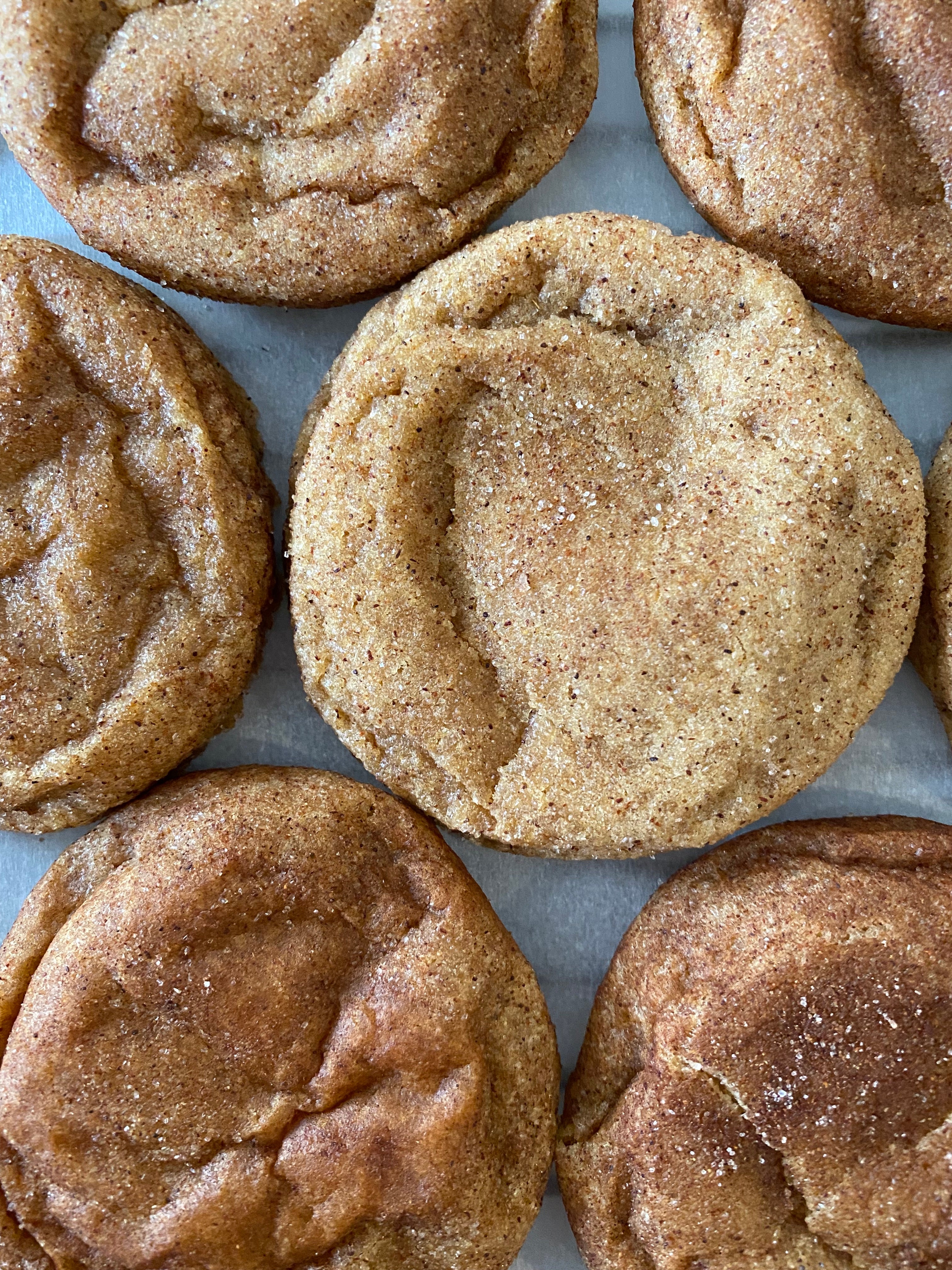 Image of several snickerdoodle cookies.